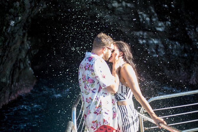 Deluxe Na Pali Morning Snorkel Tour on the Lucky Lady - Waterslide swim break: the fun between the big views