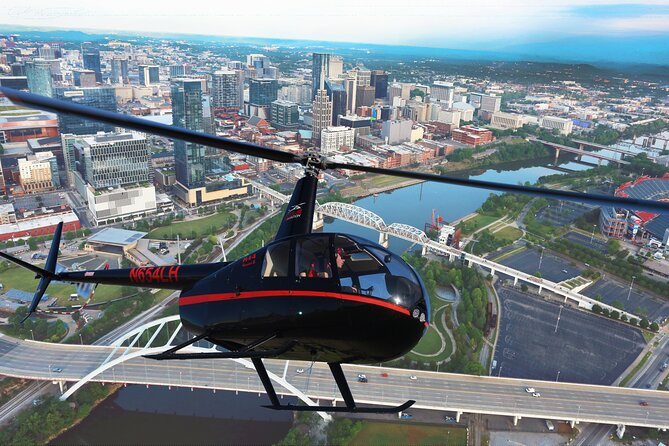 Downtown Nashville Helicopter Tour - Broadway from above: neon, rooftop bars, and real perspective