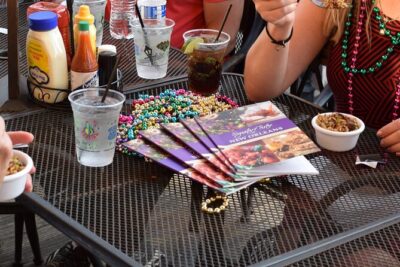 French Quarter walking Food Tour: Signature Tastes of New Orleans - Stop-by-stop: French Market, Laura’s Candies, landmarks, and more French Quarter streets