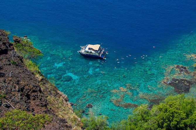 Kealakekua Bay Afternoon Snorkel: Family Fun on the Kona Coast - Cruising the Kona coast: dolphins and real place-based stops