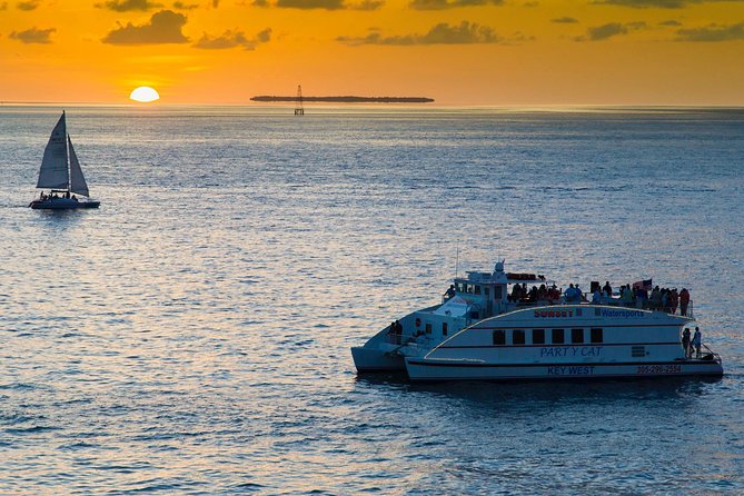 Key West Sunset Cruise: Dinner, Live Music & Drinks Included - The sunset portion: upper deck views, steel drums, and DJ energy