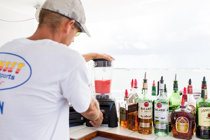 Key West Sunset Cruise: Dinner, Live Music & Drinks Included - Comfort notes: staying warm on deck and using the onboard facilities