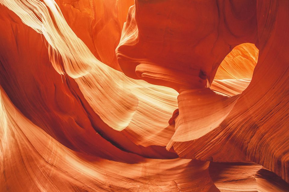 Las Vegas: Antelope Canyon & Horseshoe Bend Tour with Pickup - Antelope Canyon walkthrough: sunlight, spirals, and Navajo guidance