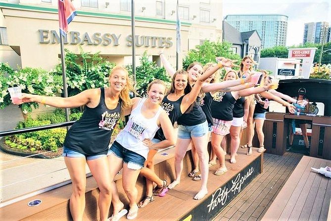 Nashville's Wildest Honky Tonk Public Party Bus (21+) - Entering the vibe: open-air layout, neon lights, and that dance-floor feel