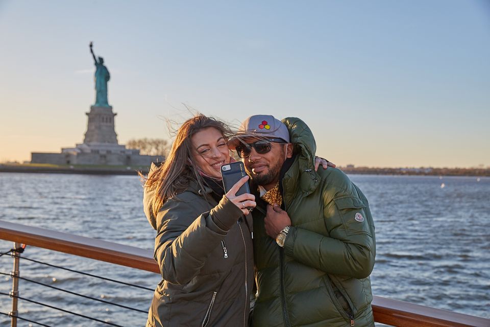 NYC: Holiday Yacht Cruise with Jazz, Cocoa & Carols - The Statue of Liberty and Ellis Island Photo Moments