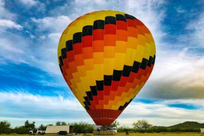 Phoenix area Hot Air Balloon Ride on the Largest Balloon in USA - The balloon inflation show: 11 stories tall, fans first, burners next