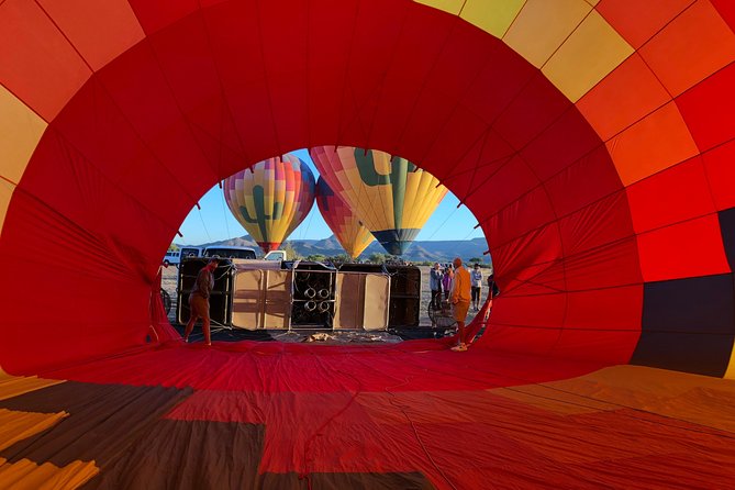 Phoenix area Hot Air Balloon Ride on the Largest Balloon in USA - The landing celebration: champagne toast, breakfast, and a first-timer tradition